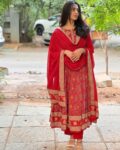 A MAROON VOLUMINOUS ANARKALI SUIT SET